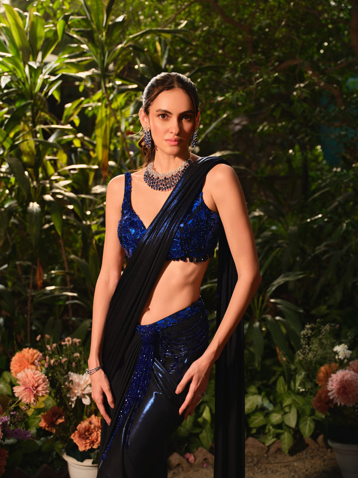 The beside her midnight blue saree set